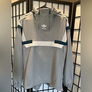 Adidas men’s small hooded jacket.  Like new condition. Gray.